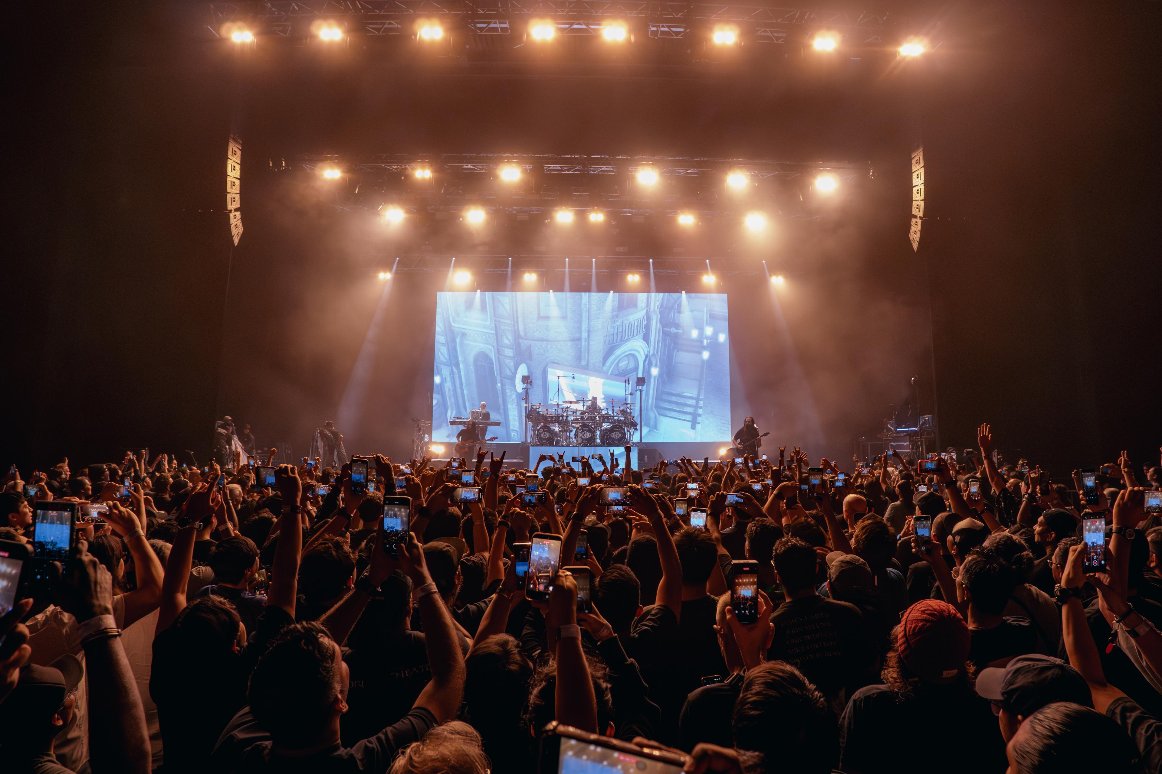 Concert crowd with phones raised